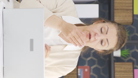 Vertical-video-of-Sick-business-woman-sneezing.