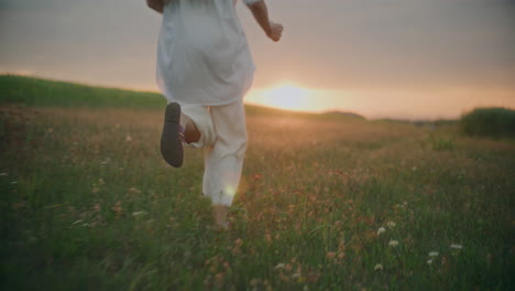 Woman-Running-On-A-Medow-At-Dusk