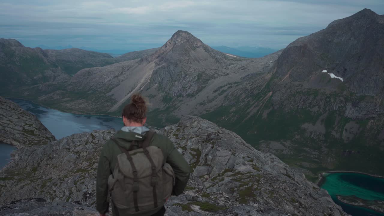Male Backpacker Exploring The Salberget Hill In Norway - static shot
