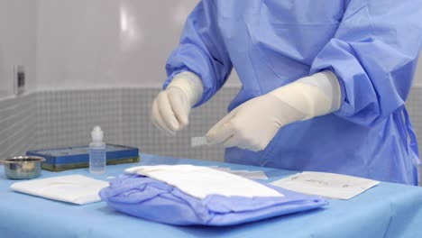 nurse preparing medical instruments before the surgery