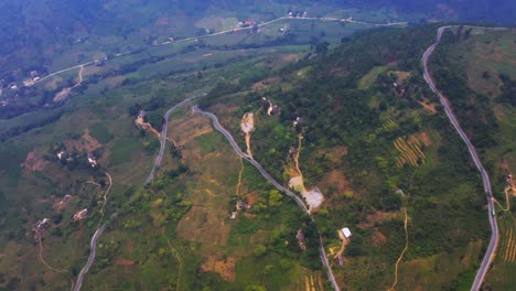 aerial ascending shot over the misty mountains of northern vietnam