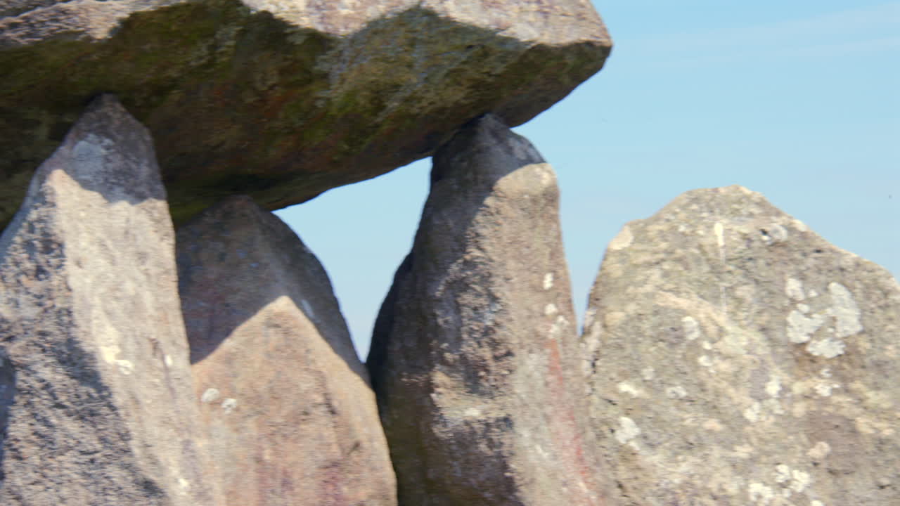 Panning sot of the capstone of pentre Ifan Burial chamber at Nevern