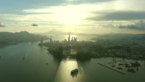 hong kong skyline at sunrise, high altitude wide aerial shot