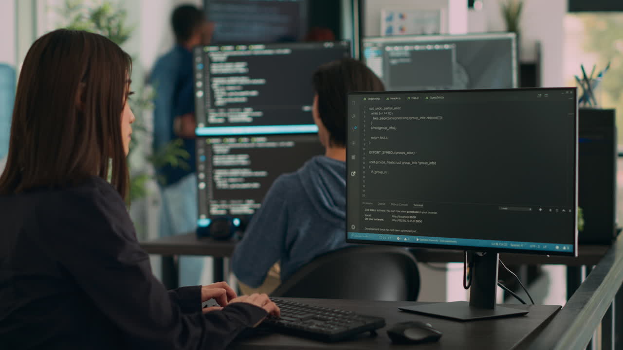 Database programer writing source code on terminal window with html script