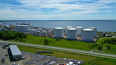 industrial fuel supplier area on the water drone flight in direction of the water in estonia