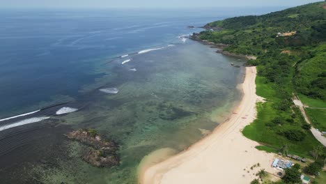 breathtaking aerial drone shot of gorgeous coastline of white sand tropical island resort in catanduanes, philippines