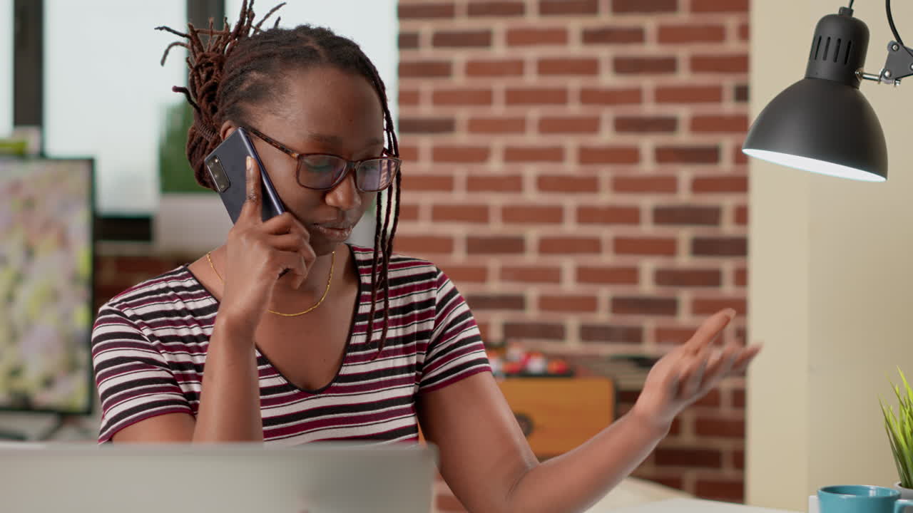 Woman on a phone call in a home office