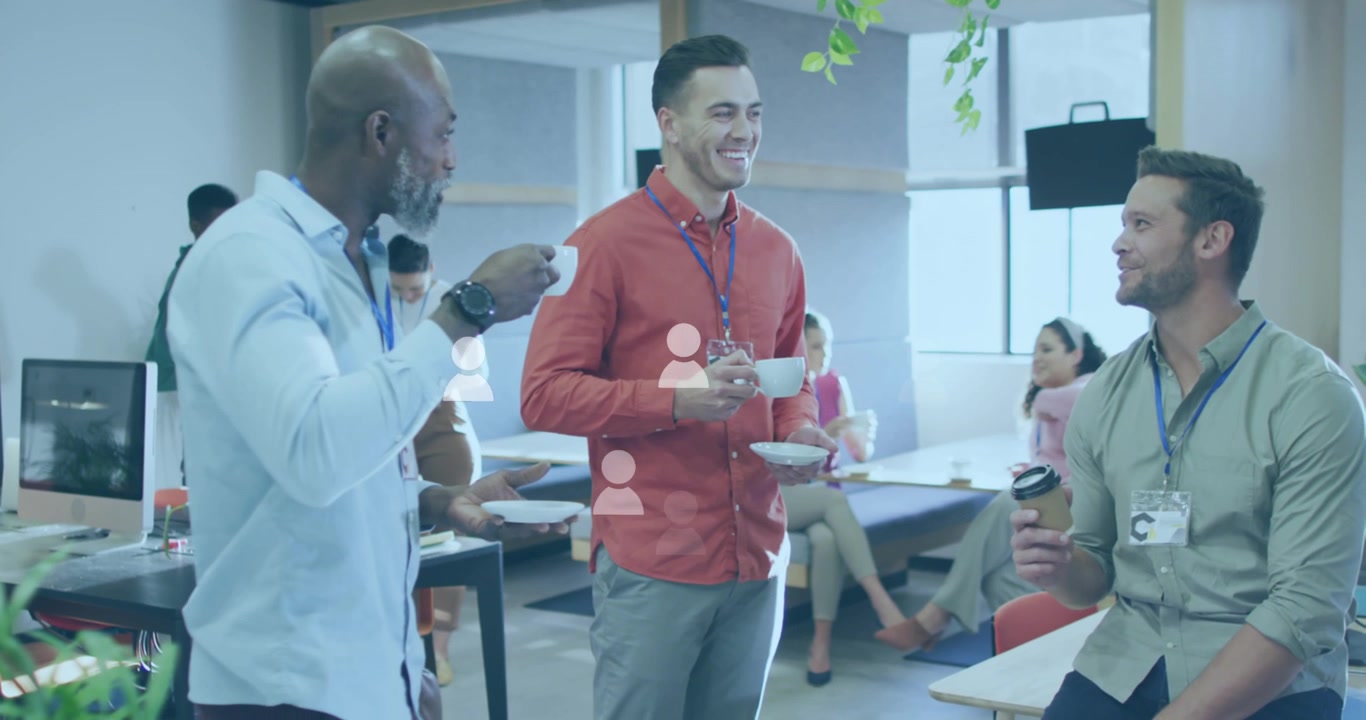 Animation of social media icons and data processing over diverse business people in office