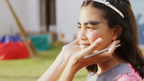 woman applying make-up on girl cheeks 4k