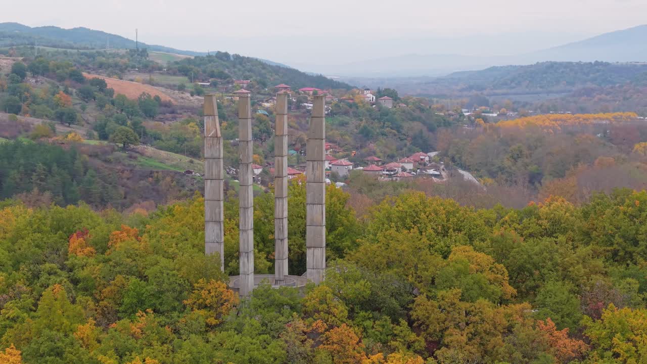 Drone with telephoto lens orbits Samuil's Fortress perched on a hilltop, capturing the historic monument and surrounding scenic landscape in detail