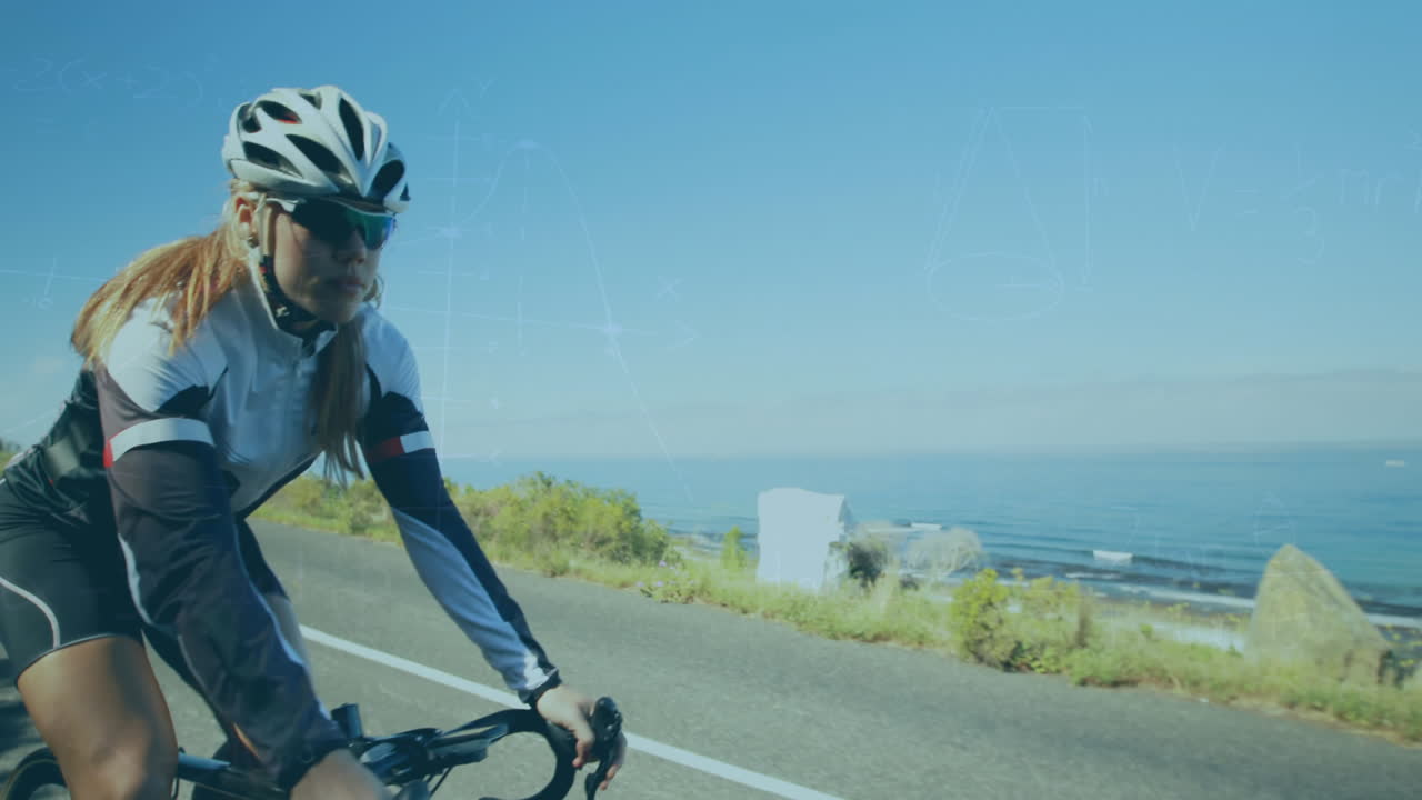 바다에 맞서 도로에서 자전거를 타는 백인 여성에 대한 수학적 기호의 애니메이션