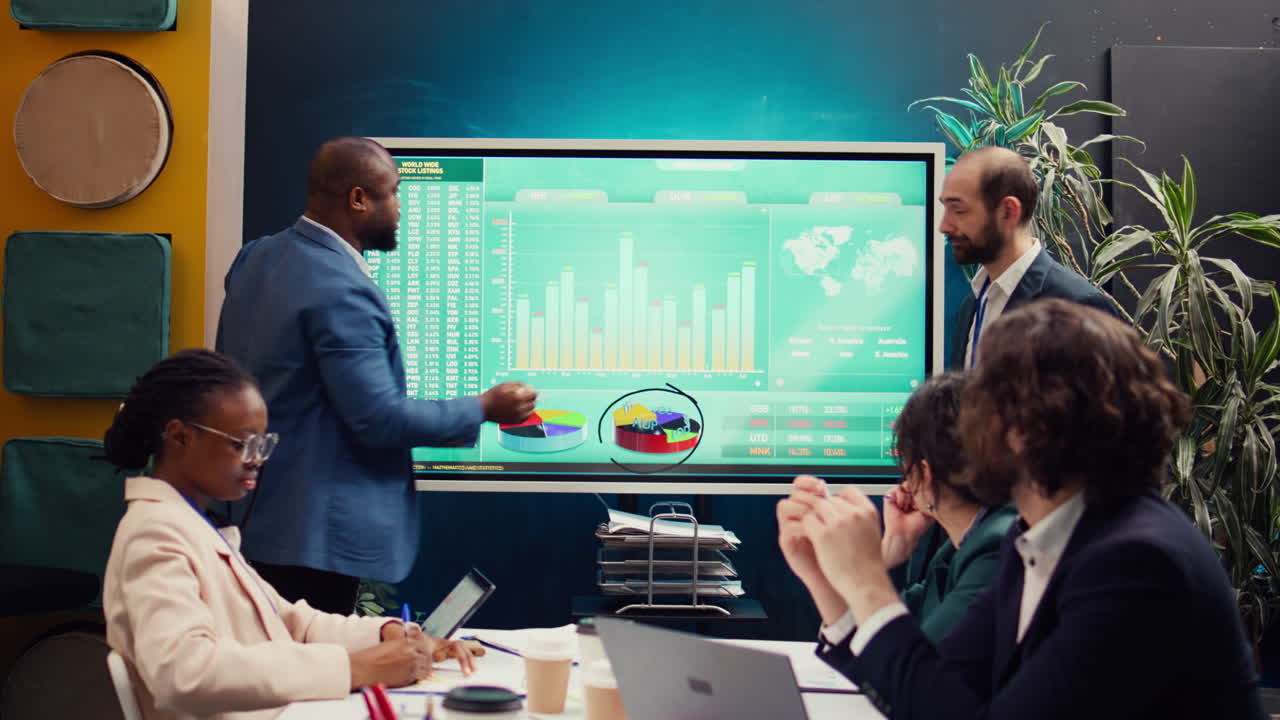 Account executive team analyzing trends to help in making important decisions