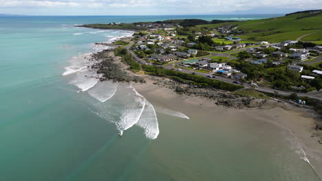 drone flight along picturesque coastline of riverton, new zealand