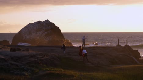 land's end san francisco with a beautiful view of the ocean and a photo shooting going on