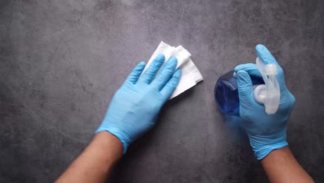 cleaning surface with gloves and wipes