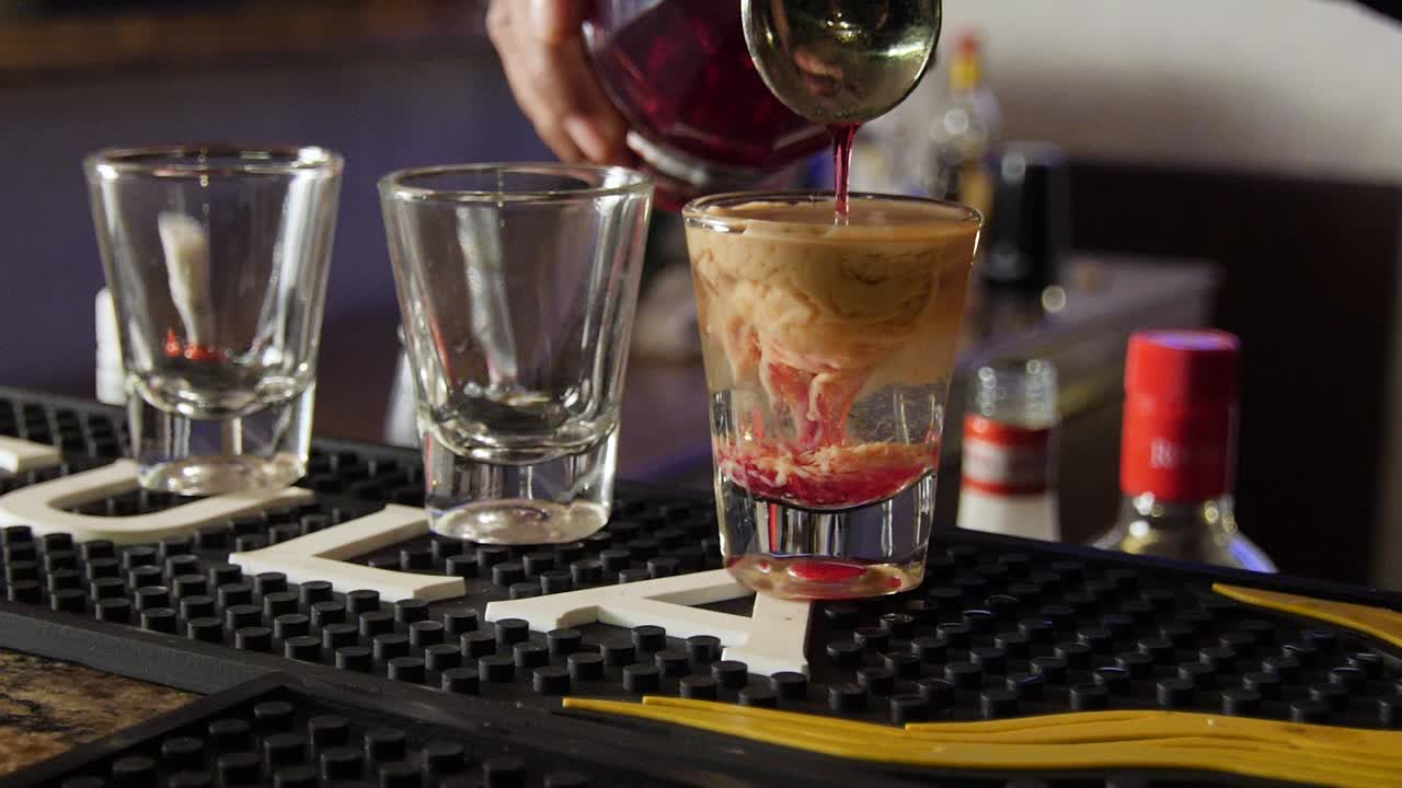 Alcohol being poured into a glass.