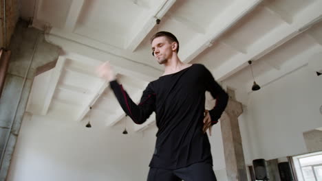 male dancer performing in a studio