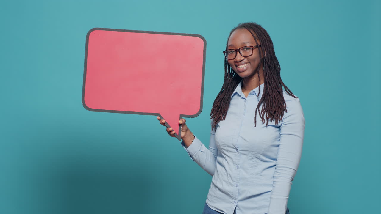 African american person holding mockup speech bubble