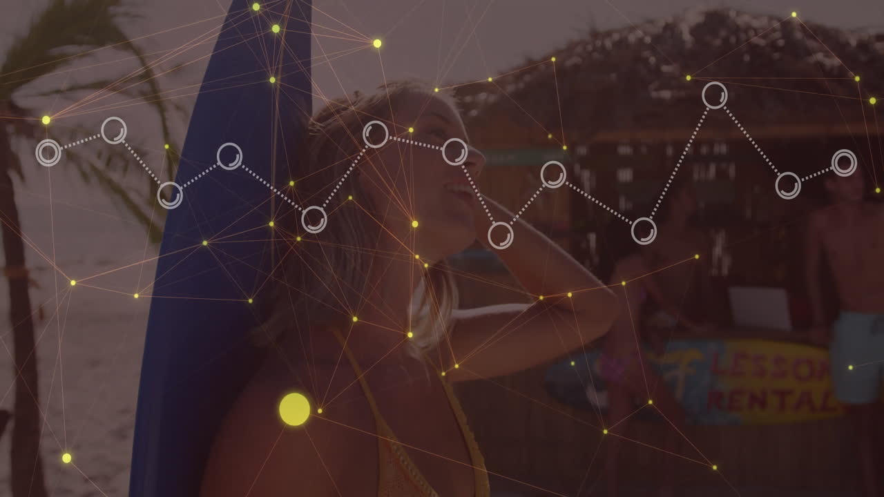 woman holding surfboard overhead on beach, showing technology network nodes with connection lines