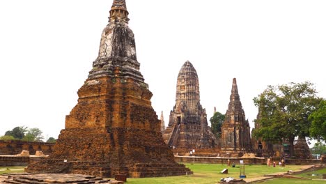 visitors explore historic temple in ayutthaya, thailand