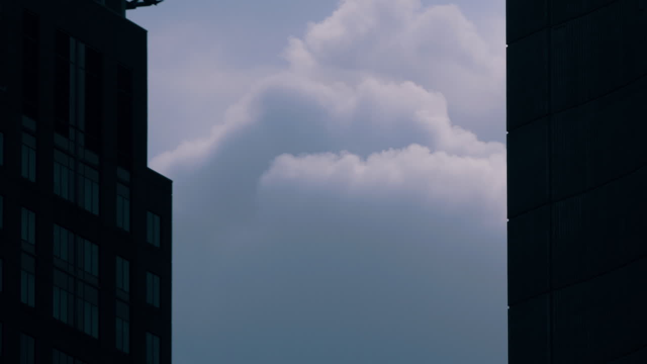 Big Heavy Clouds Between Two Skyscrapers - static shot