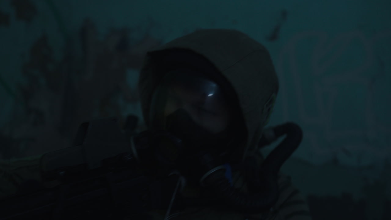 A wounded soldier in the abandoned military complex during the recon mission