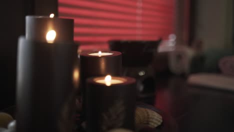 dark candles in interior setting