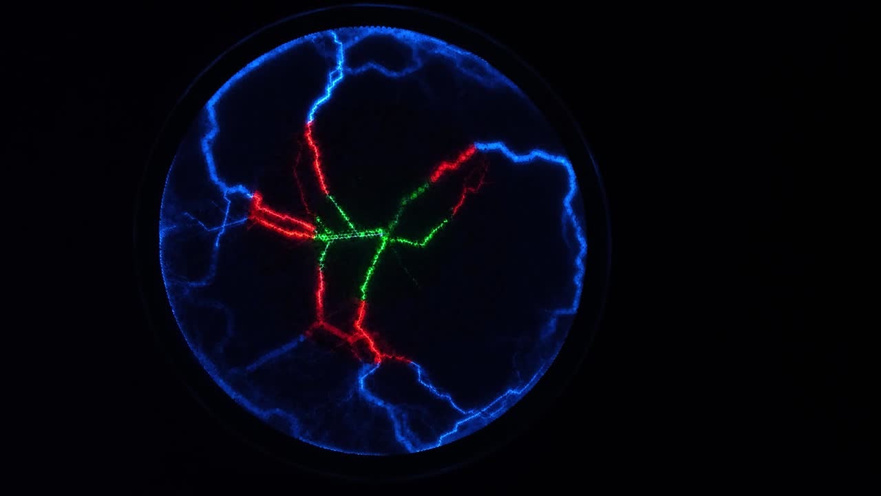 fondo de la ciencia abstracta y el objeto, iluminación eléctrica. rayos rojos, verdes y azules