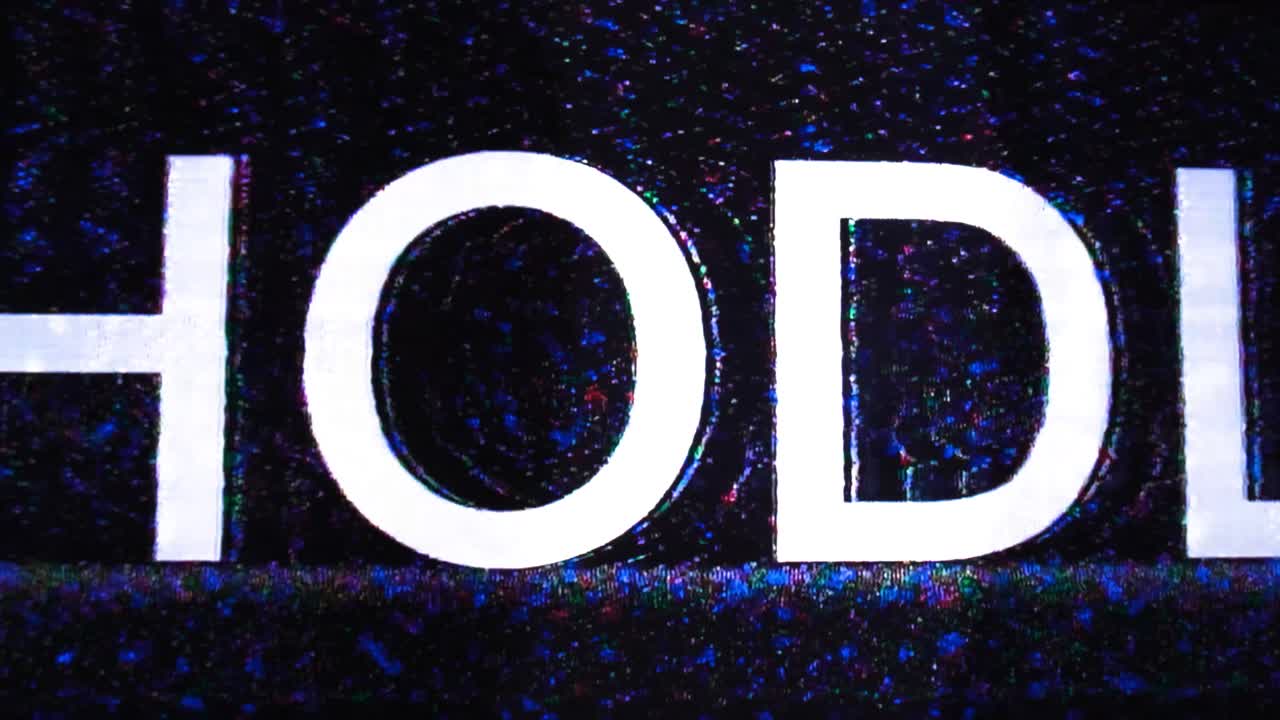 HODL or hold zoom in glitch with strong blue chromatic aberrations glitch noise lines