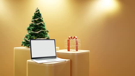 laptop, christmas tree, and wrapped gift on yellow background