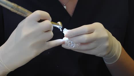 close-up view of a dentist working on a patient's teeth