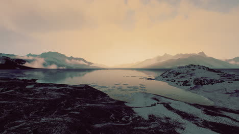 View-of-a-landscape-of-a-Norwegian-fjord-with-a-snowy-mountain-and-rocks