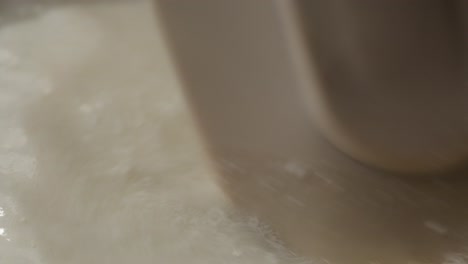 boiling water and stirring