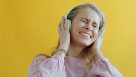 woman enjoying music with headphones