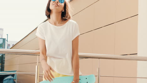 stylish woman with skateboard