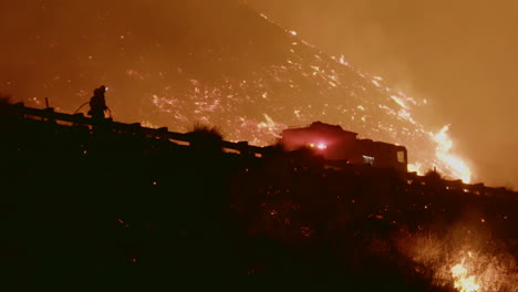 firefighters battle the massive thomas fire in ventura california along a major freeway