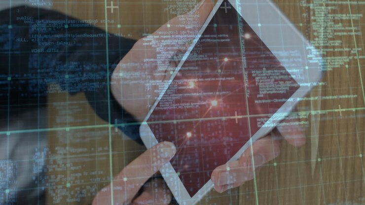 Animation of data processing over businessman using tablet
