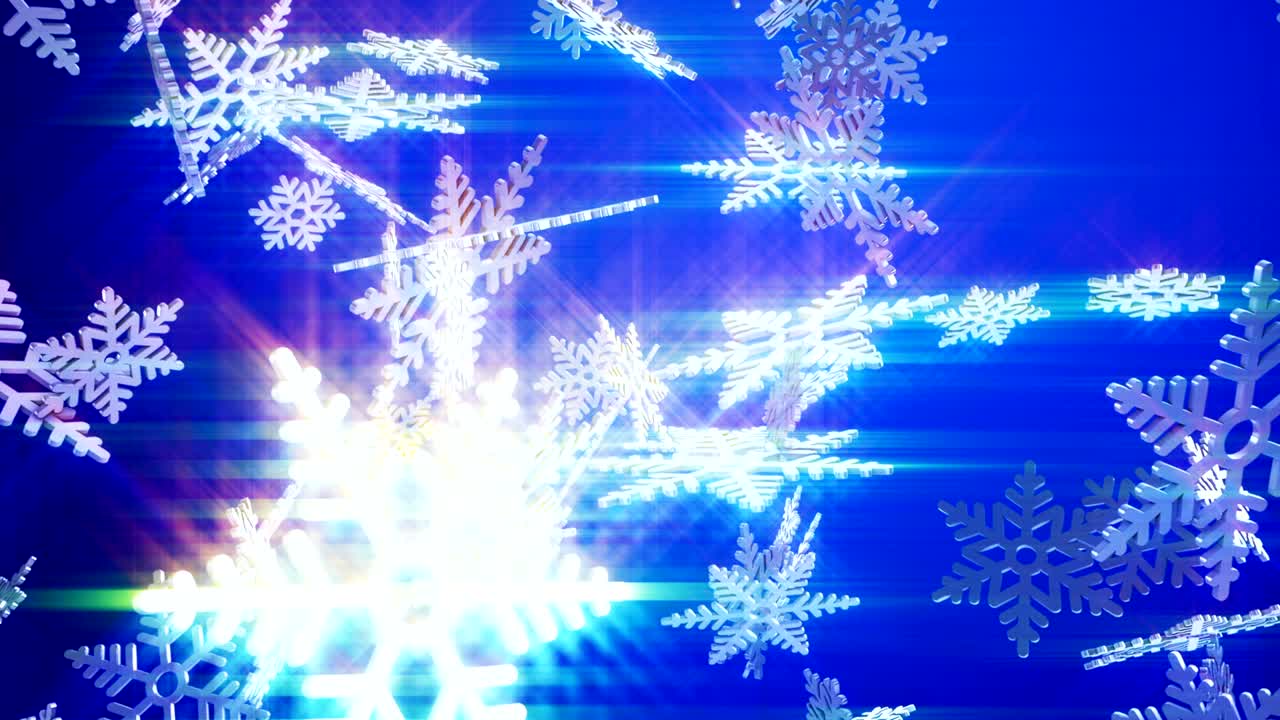 파란색 배경에 눈송이가 떨어집니다.