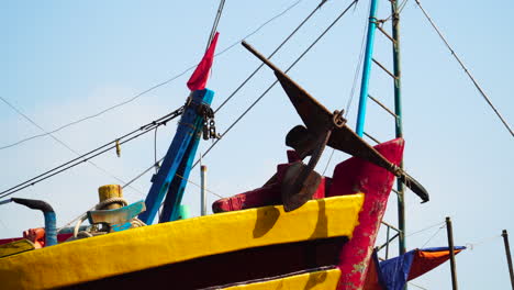 a close-up shot of a nose of a colourful ship