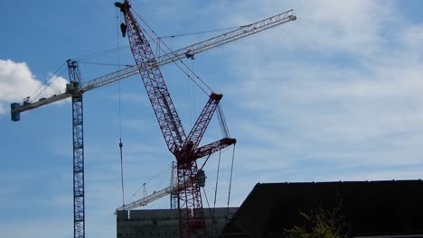 construction crane at a busy building site in an urban downtown area