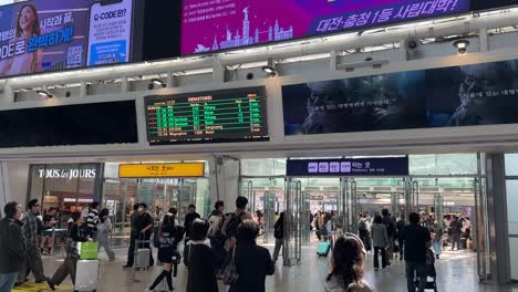 travelers arriving and departing (seoul central train station) during a busy holiday weekend.