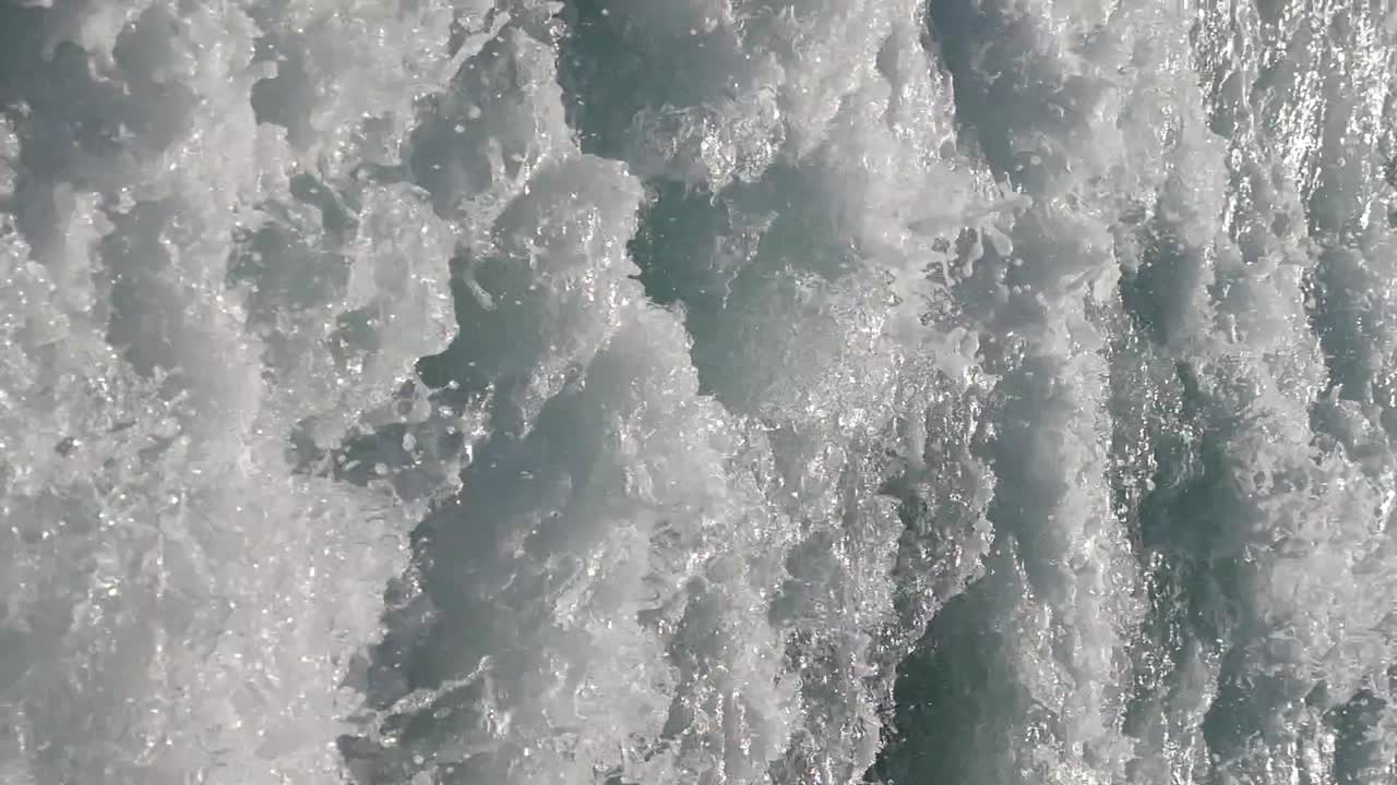 Close-up of Water Waves and Foam