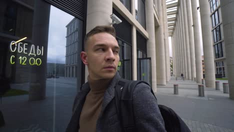 businessman walking in a modern city