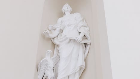 may 29, 2022: parts of cathedral basilica in vilnius, lithuania, beautiful sculptures of basilica, 4k video
