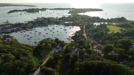 drone shot of the woods hole eel pond, a safe refuge for boats in cape cod