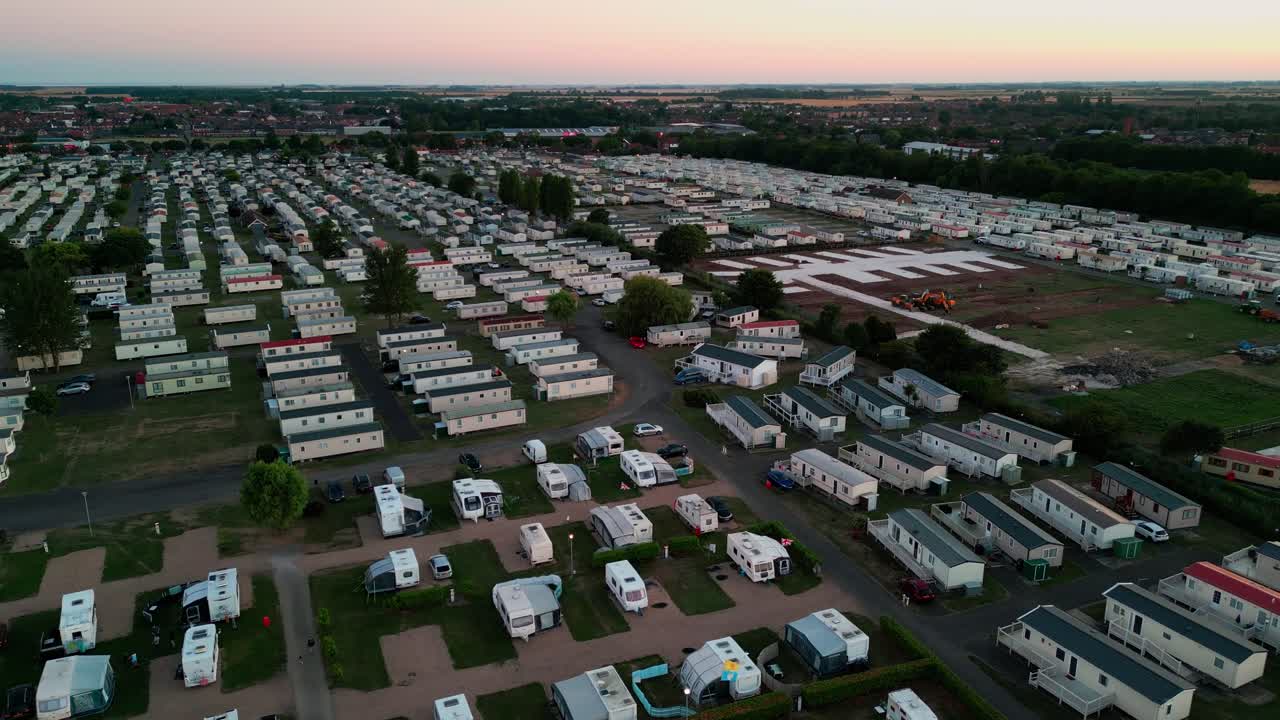 Sunset aerial footage of static caravan holiday homes, in the  coastal town of Skegness in Lincolnshire, England