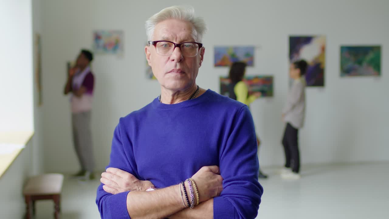 Portrait of Mature Man in Art Gallery