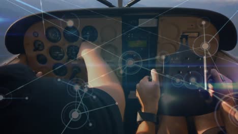 red de conexiones contra la sección media de dos pilotos que vuelan una aeronave privada