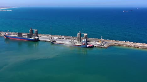 cargo ship loading/unloading at a port