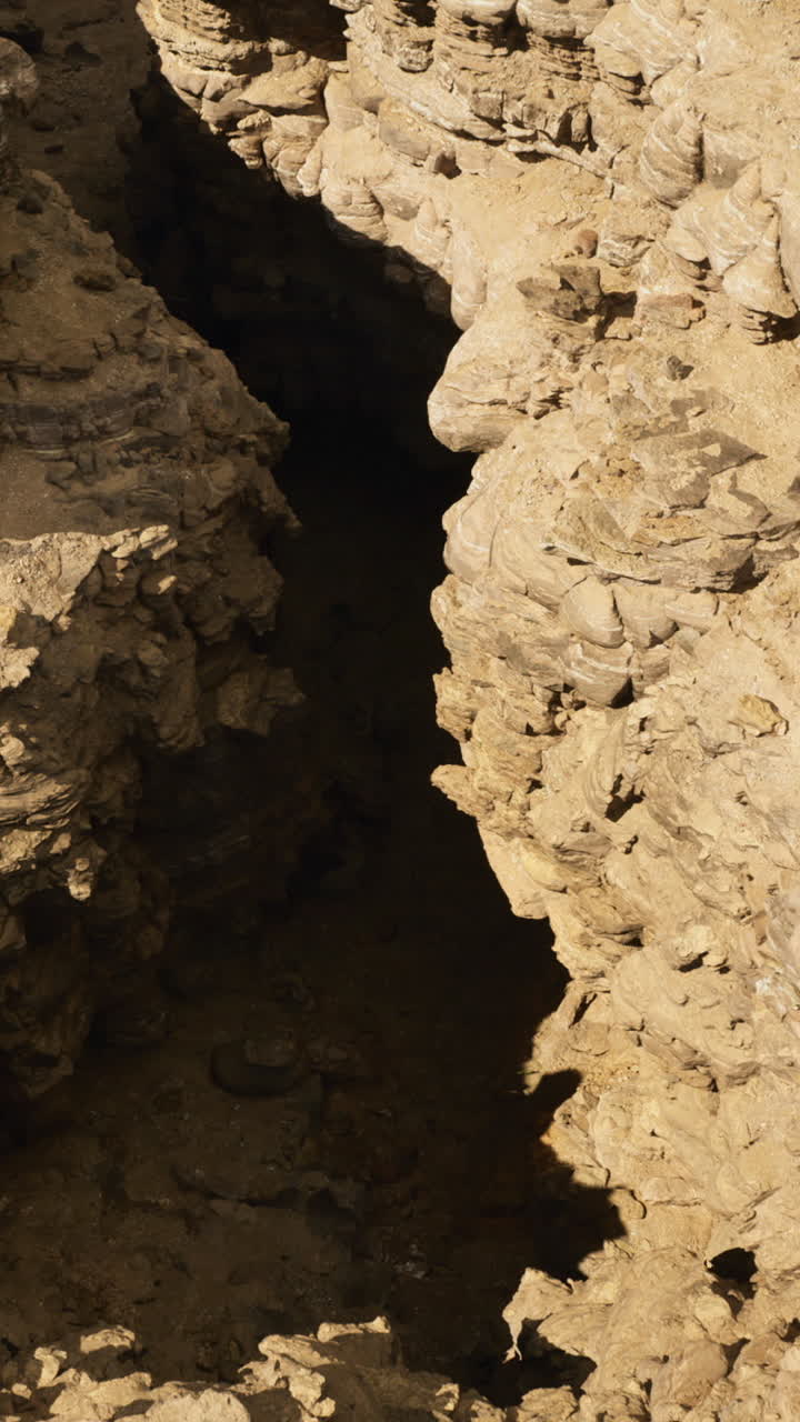 Canyon view with rugged rocks under bright sunlight